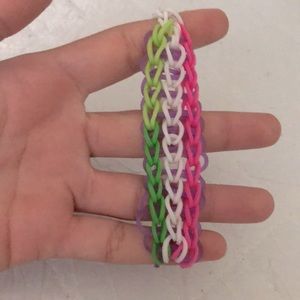 Rainbow loom, green, white, pink, purple, white.